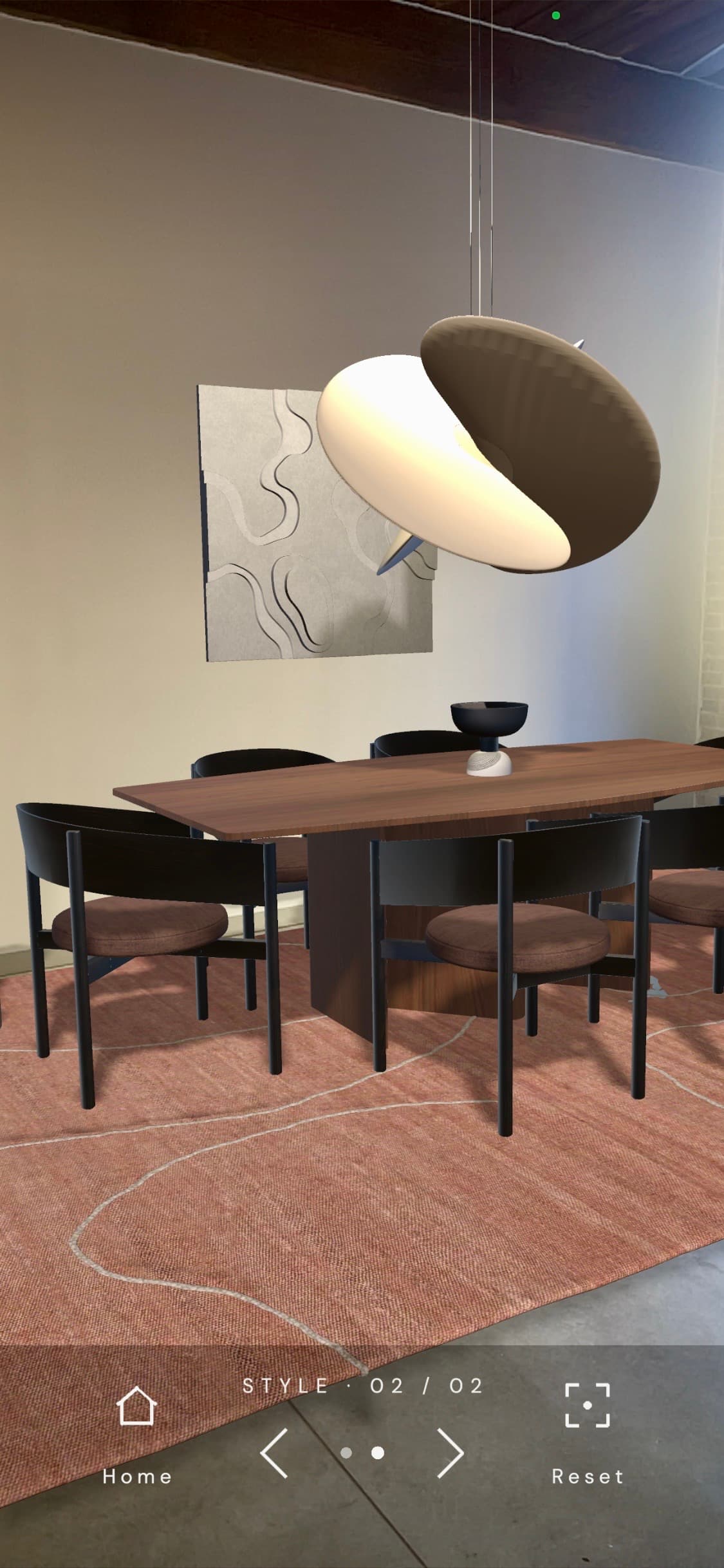 The Stilar app showing a furnished dining room rendered in AR inside an empty unit